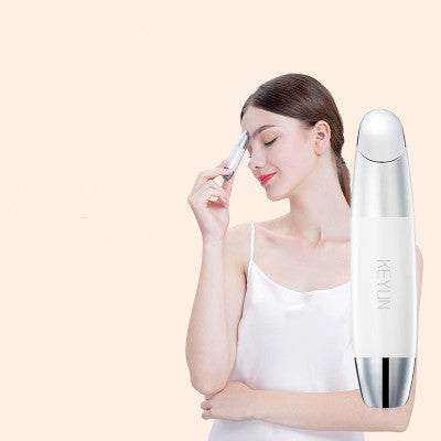 Dark Circles Beauty Home Eye Care Device in use, white and silver design.