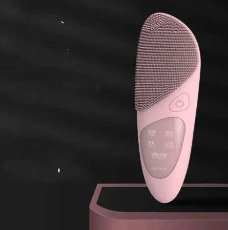 Pink thermal facial cleansing brush with ultrasonic and heating features on black background