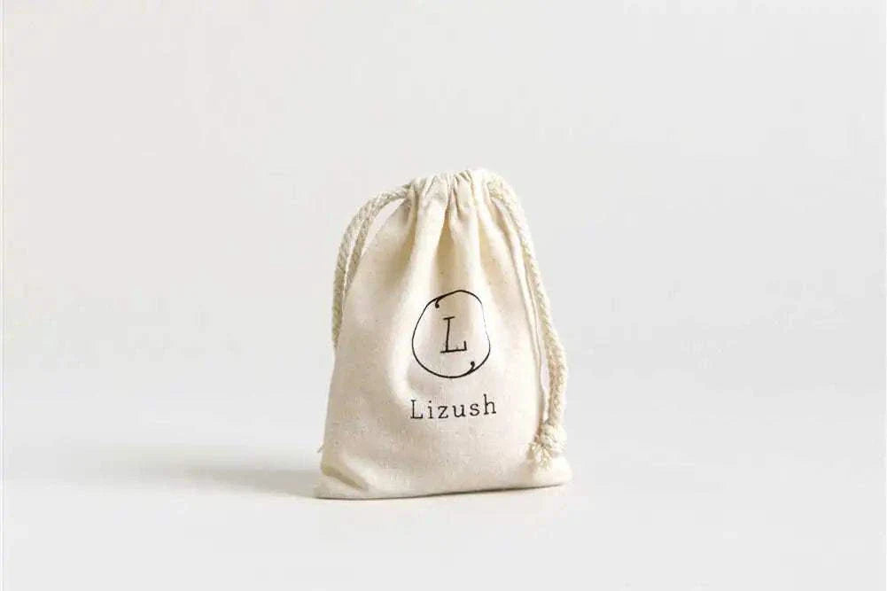 Cotton drawstring bag for Pure Blend Beard Nourishment Oil packaging