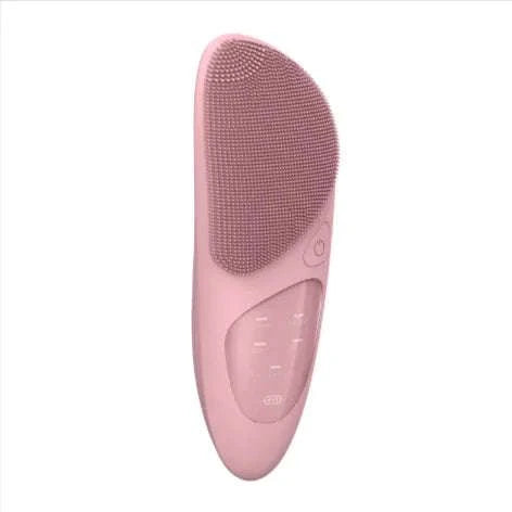 Pink thermal facial cleansing brush with soft silicone bristles and adjustable heating levels