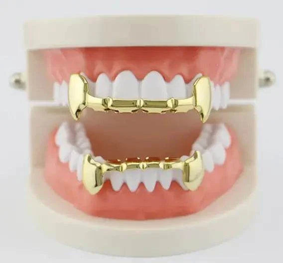 Gold silver bucktooth caps hip-hop style tooth grillz on dental model