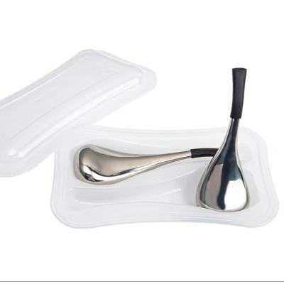 Stainless steel eye massage ice scoop with ergonomic design for depuffing and soothing.