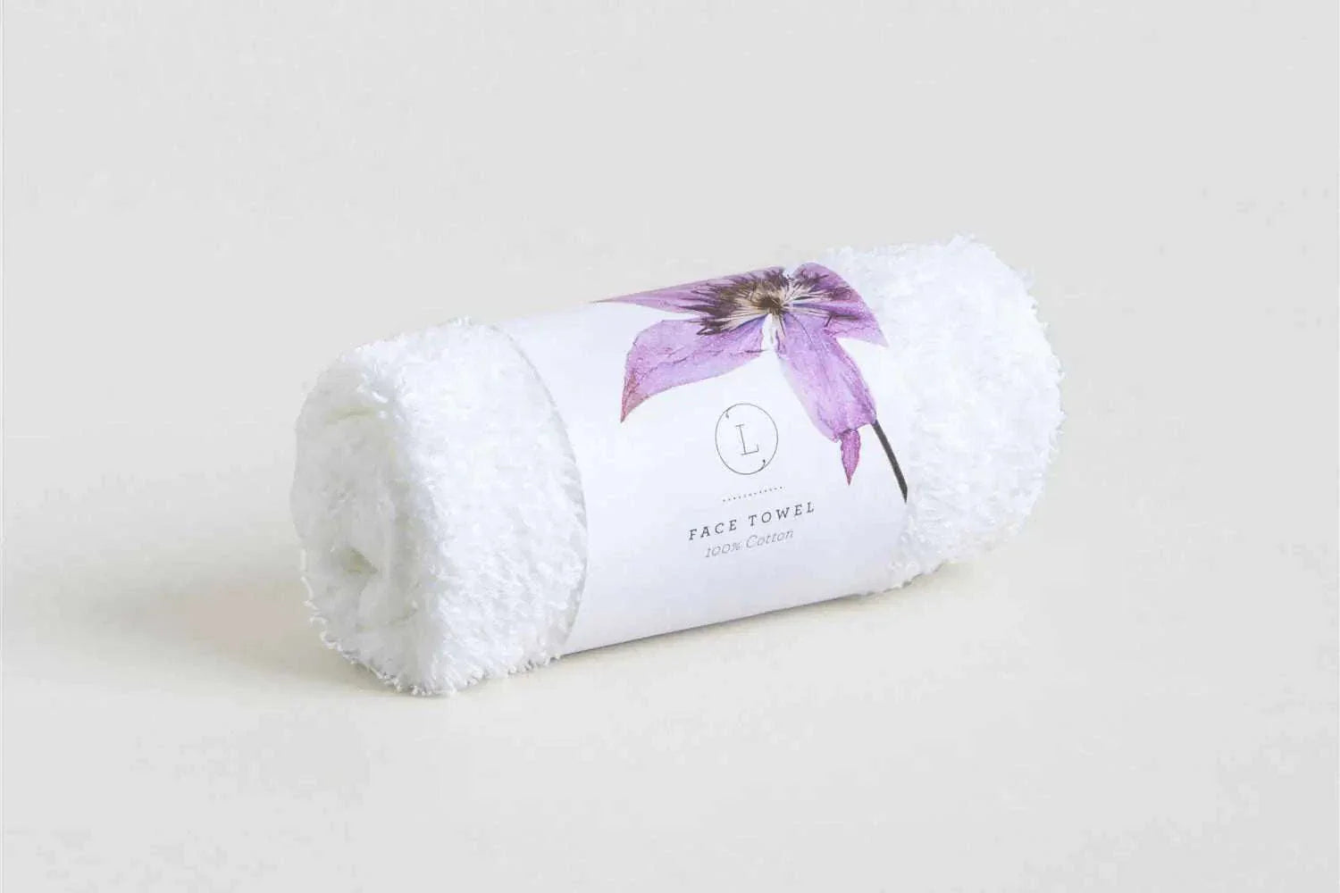 White rolled cotton face towel with floral paper band for Cherish Skincare Luxury Gift Box for Her