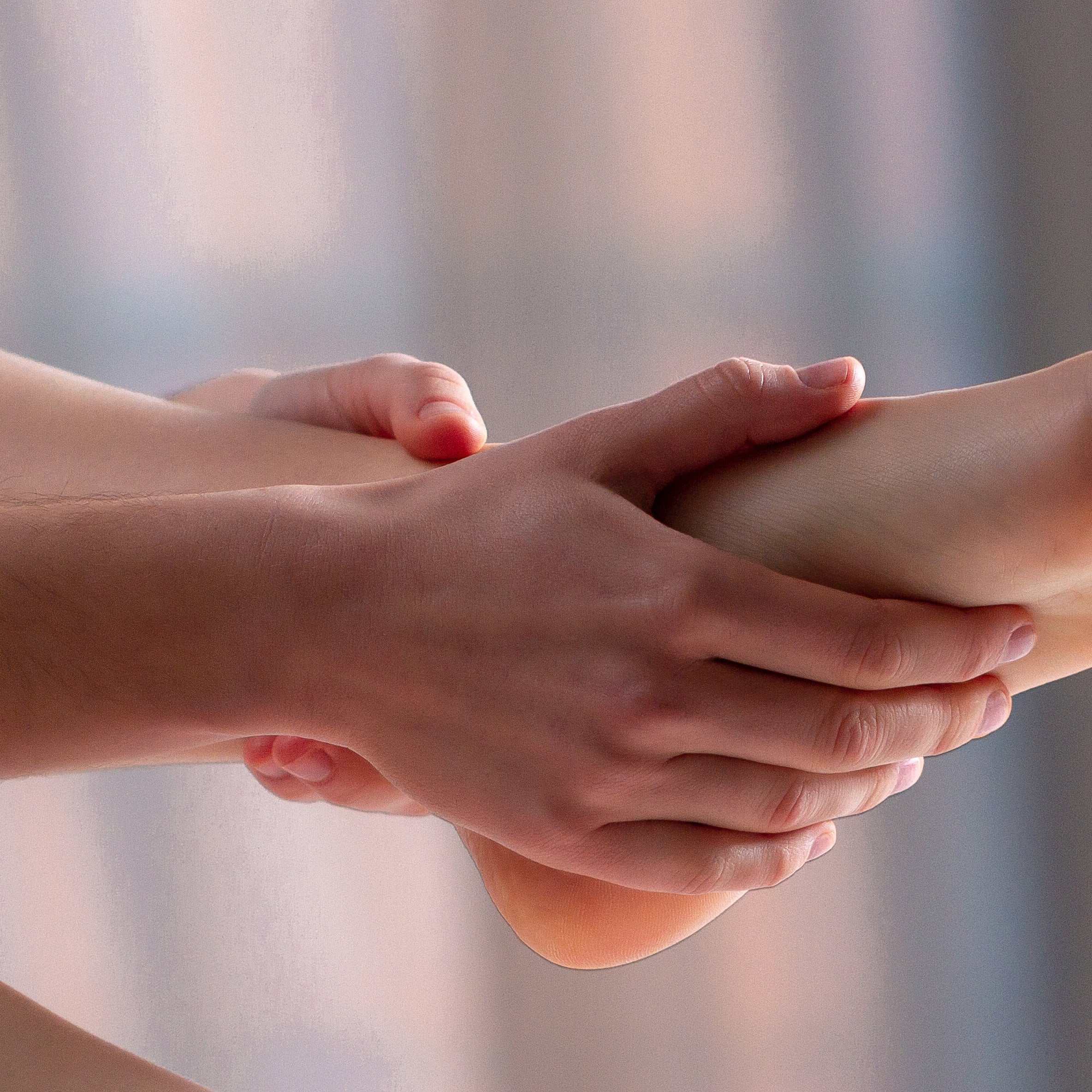 Applying Luv Me Lotion Bar for soothing skin hydration.